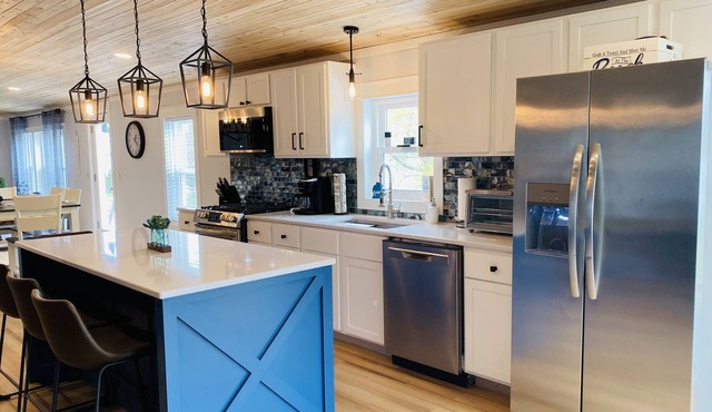 Best View on Torch lake! Private frontage, boat dock and across from the sandbar