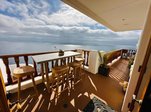 Coastal villa w wrap-around balcony