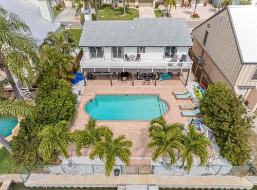Stunning Waterfront Pool Home Walk to Beach & Restaurants Large Private Pool